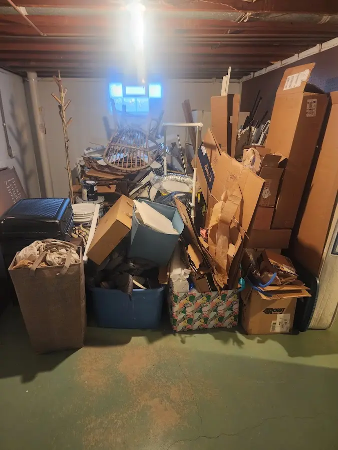 Roll-off dumpster container at job site for Cleanout Dumpster Rental in Wenham